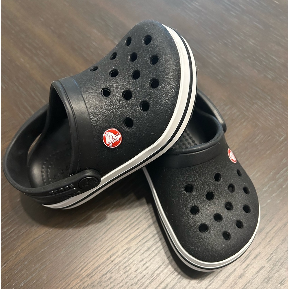 Black and white toddler crocs. Toddler size 6.